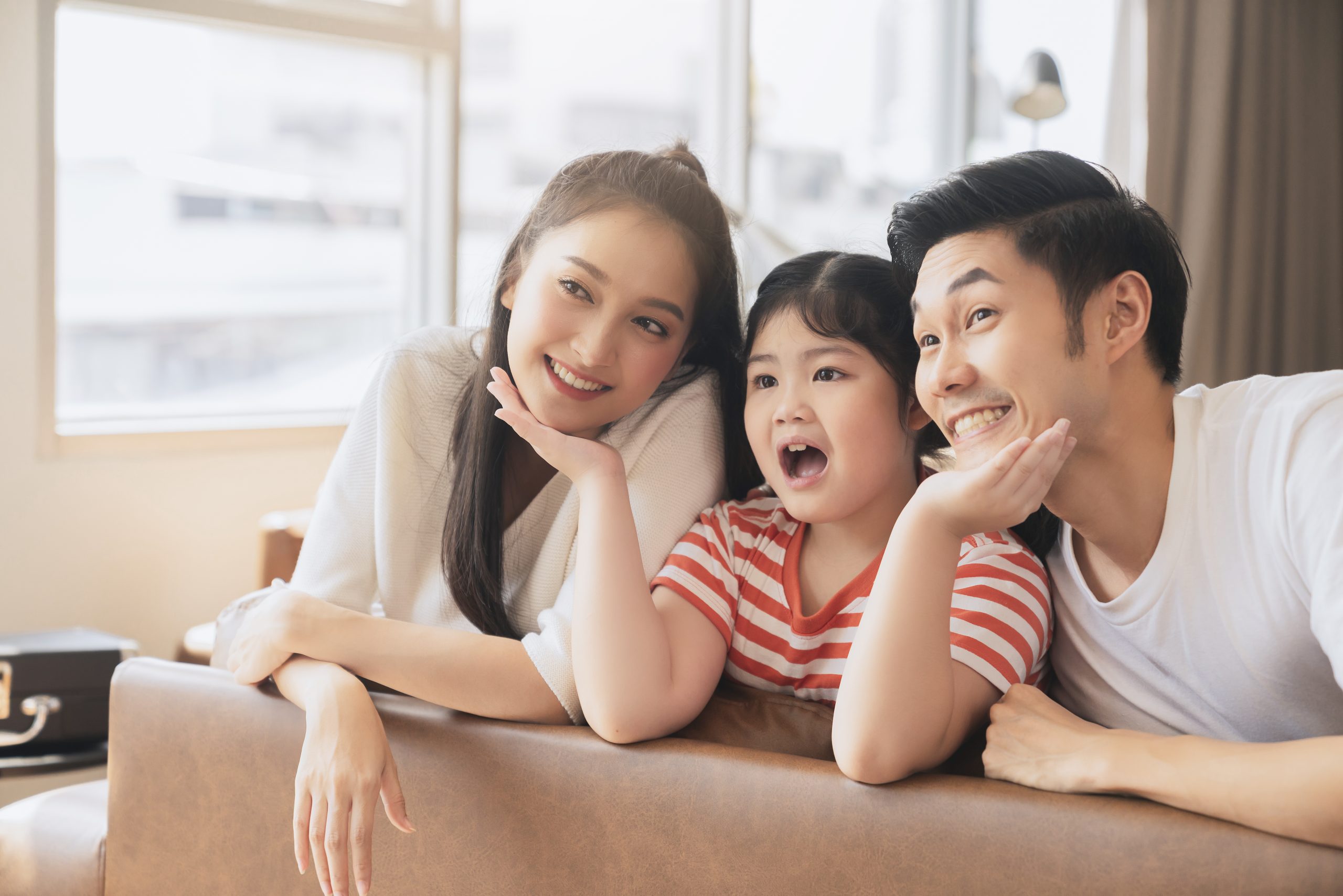 happy attractive young asian family portrait healthy harmony life family day concept asian family man woman little girl having good time together scaled